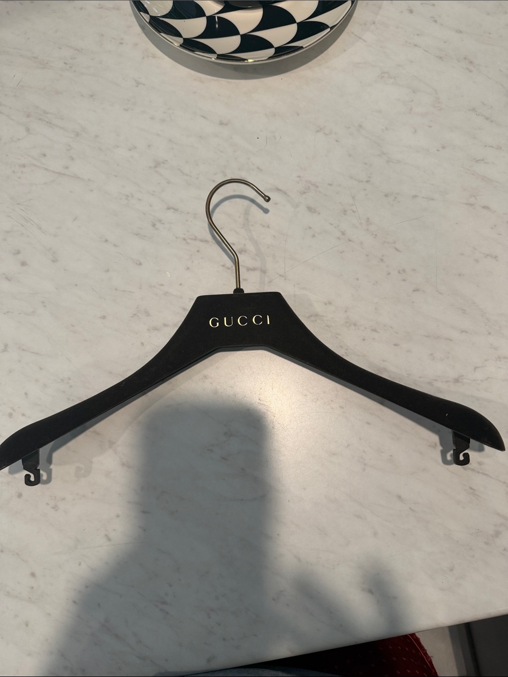 Gucci Black Hanger with Gold Logo Accent